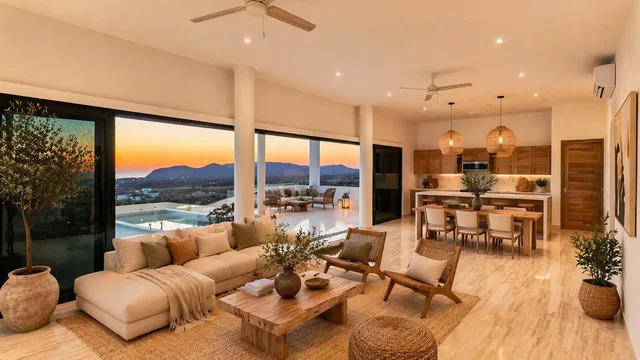 Living, kitchen, terrace and pool at dusk at Casa Mirador Pescadero in El Pescadero